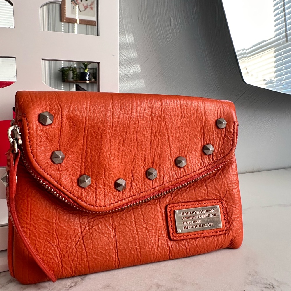 Genuine Harley-Davidson leather clip pouch. Orange with studs.